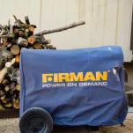 Large generator covered with a protective cover installed outdoors for weather protection