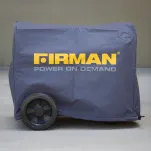Generator covered with a protective inverter cover installed outdoors